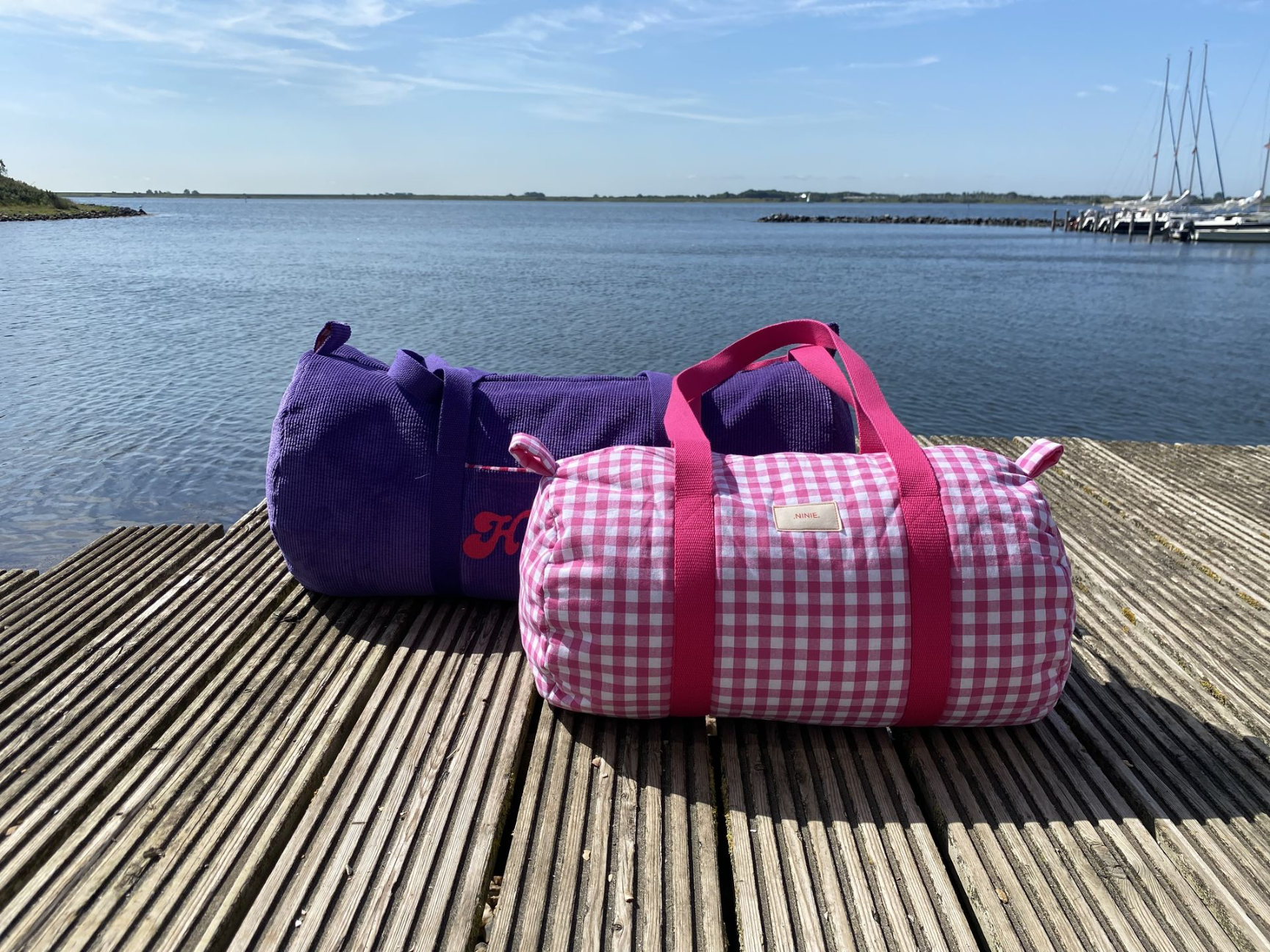 sac polochon Maxi en velours et sac polochon mini fuchsia